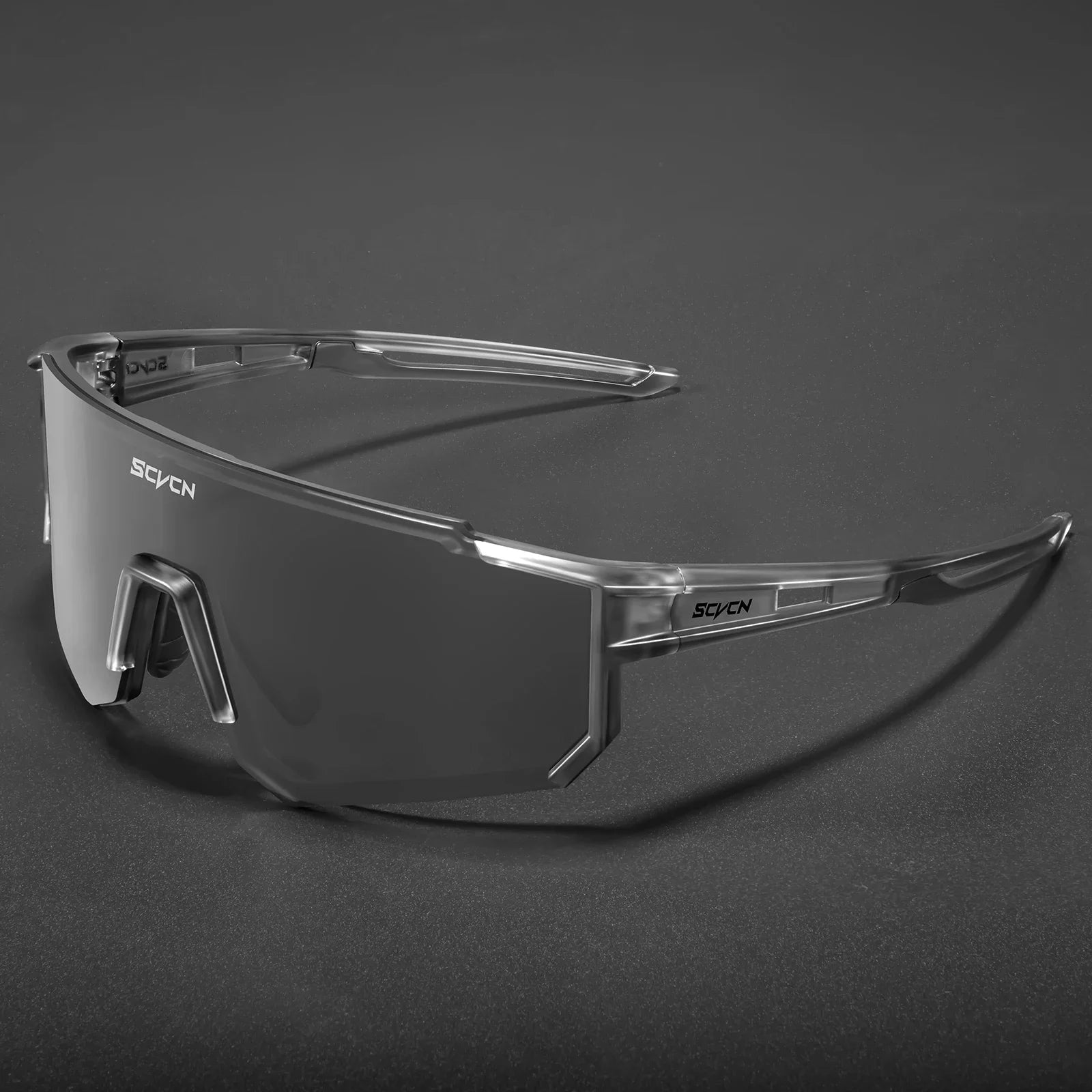 Lunettes Cyclisme SCVCN - Protection UV400 avec monture transparente et verres noirs, idéales pour le sport en extérieur. Confort et performance assurés.