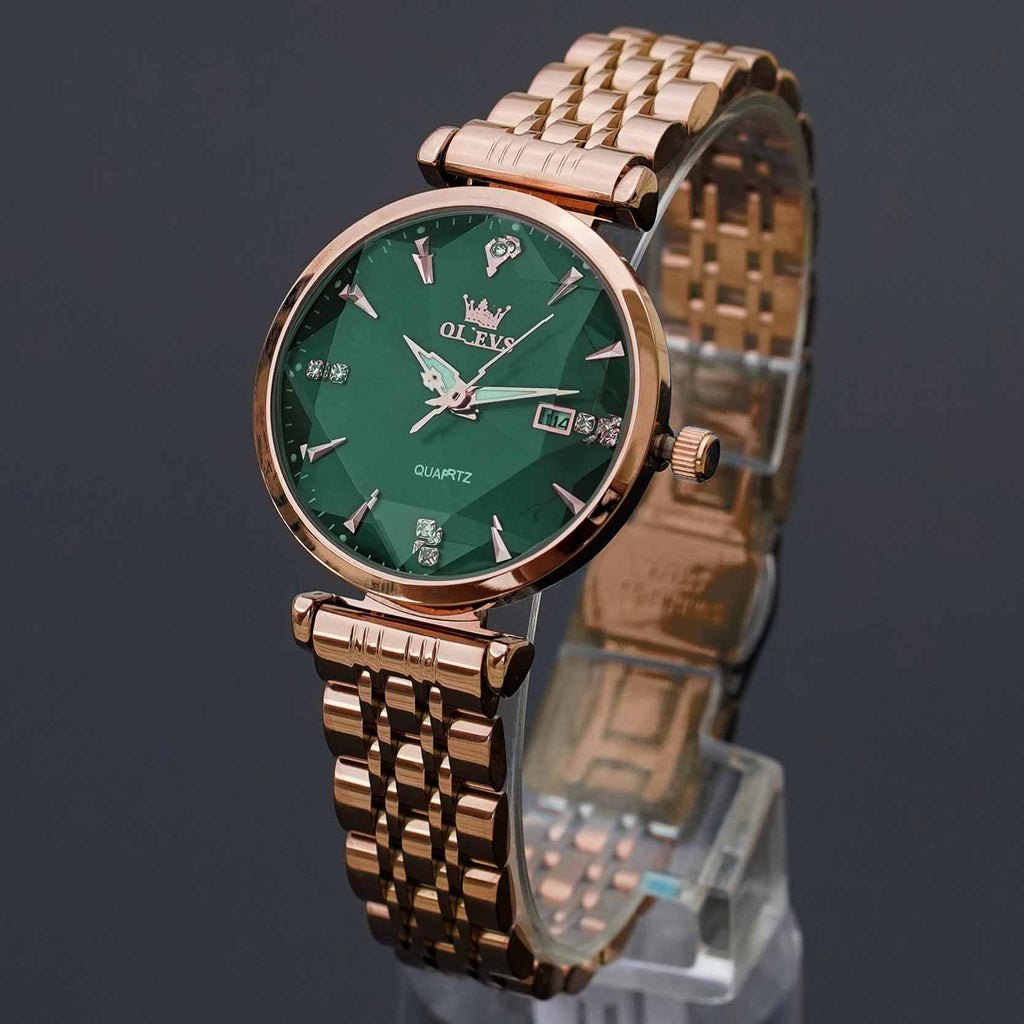 Montre Aura avec cadran vert élégant et bracelet doré ajustable, mécanisme à quartz, étanchéité 30m. Livraison rapide 48H RunShop.