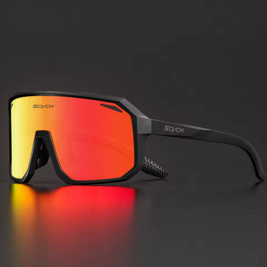 Lunettes de cyclisme haute performance avec verres larges et protection UV intégrale. Monture résistante et design sportif pour compétitions et balades.